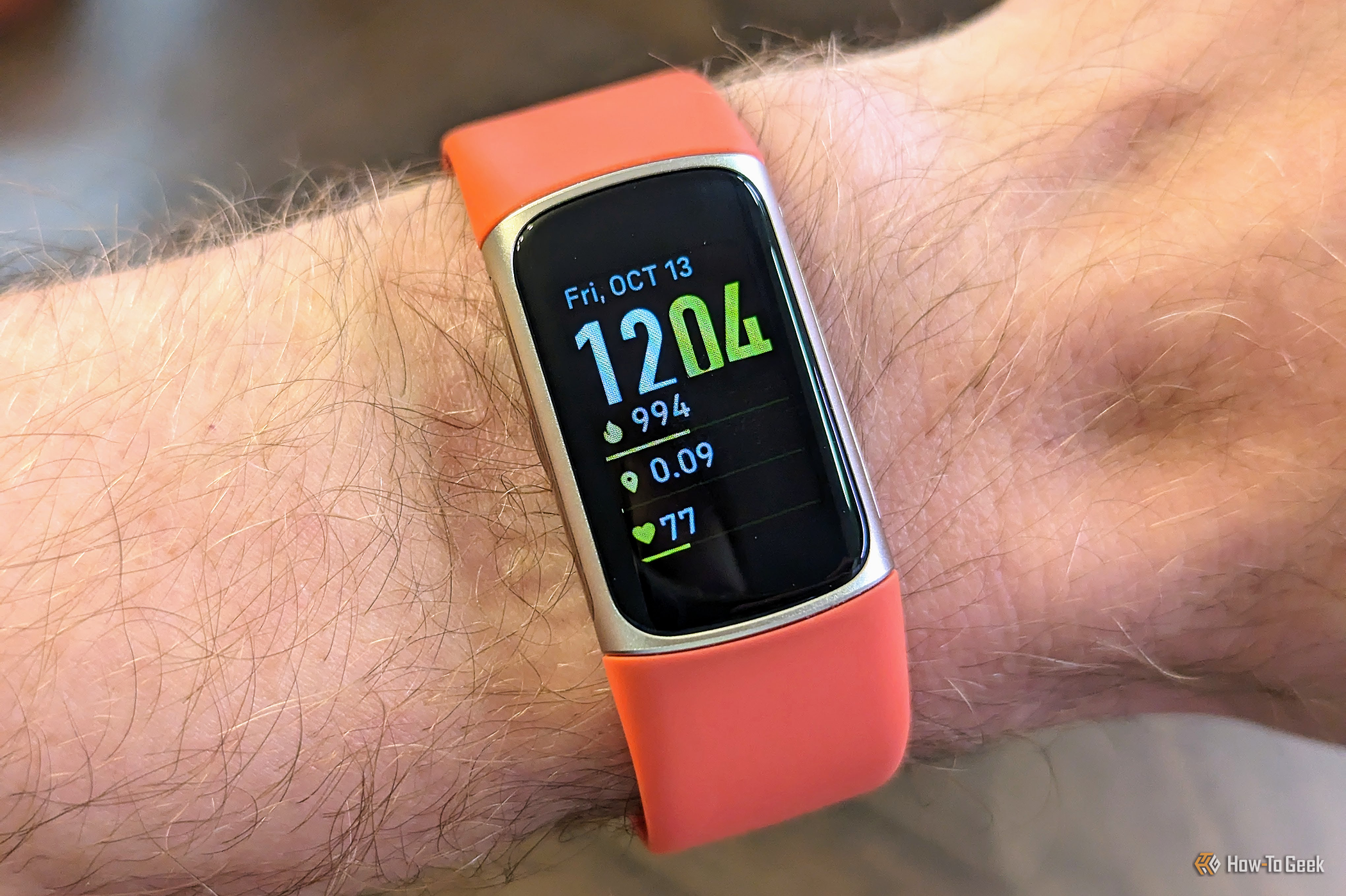 Spotify на Fitbit: подключение и управление