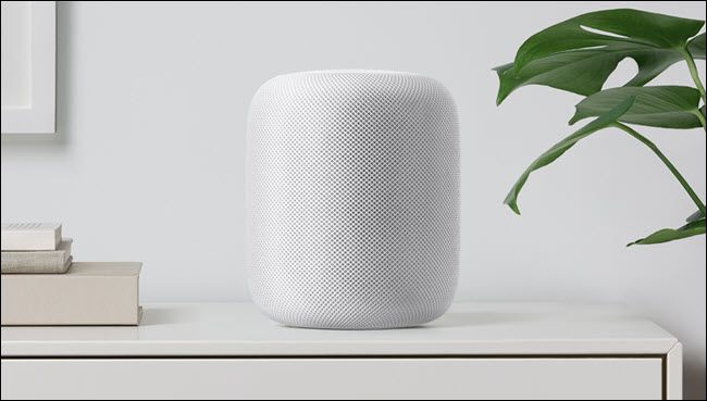 Homepod speaker on a filing cabinet.