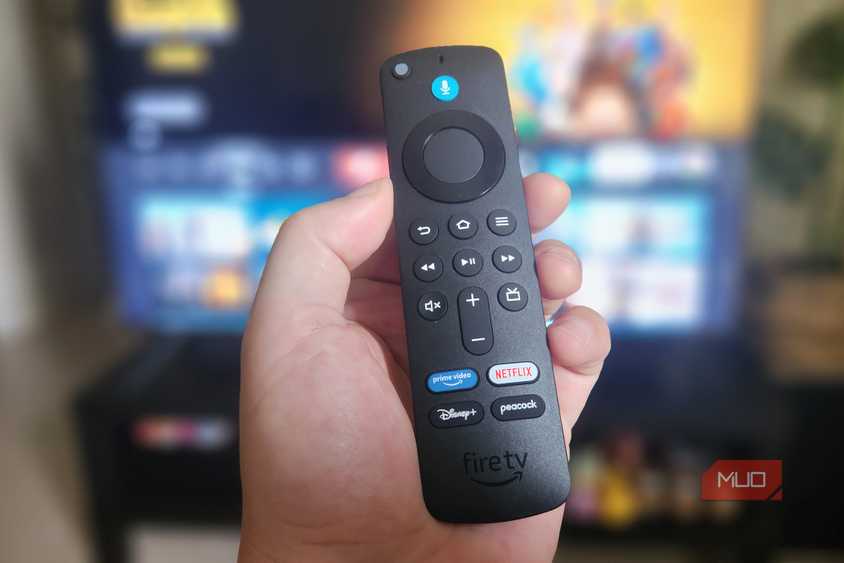 The Fire TV Stick Remote in a hand.