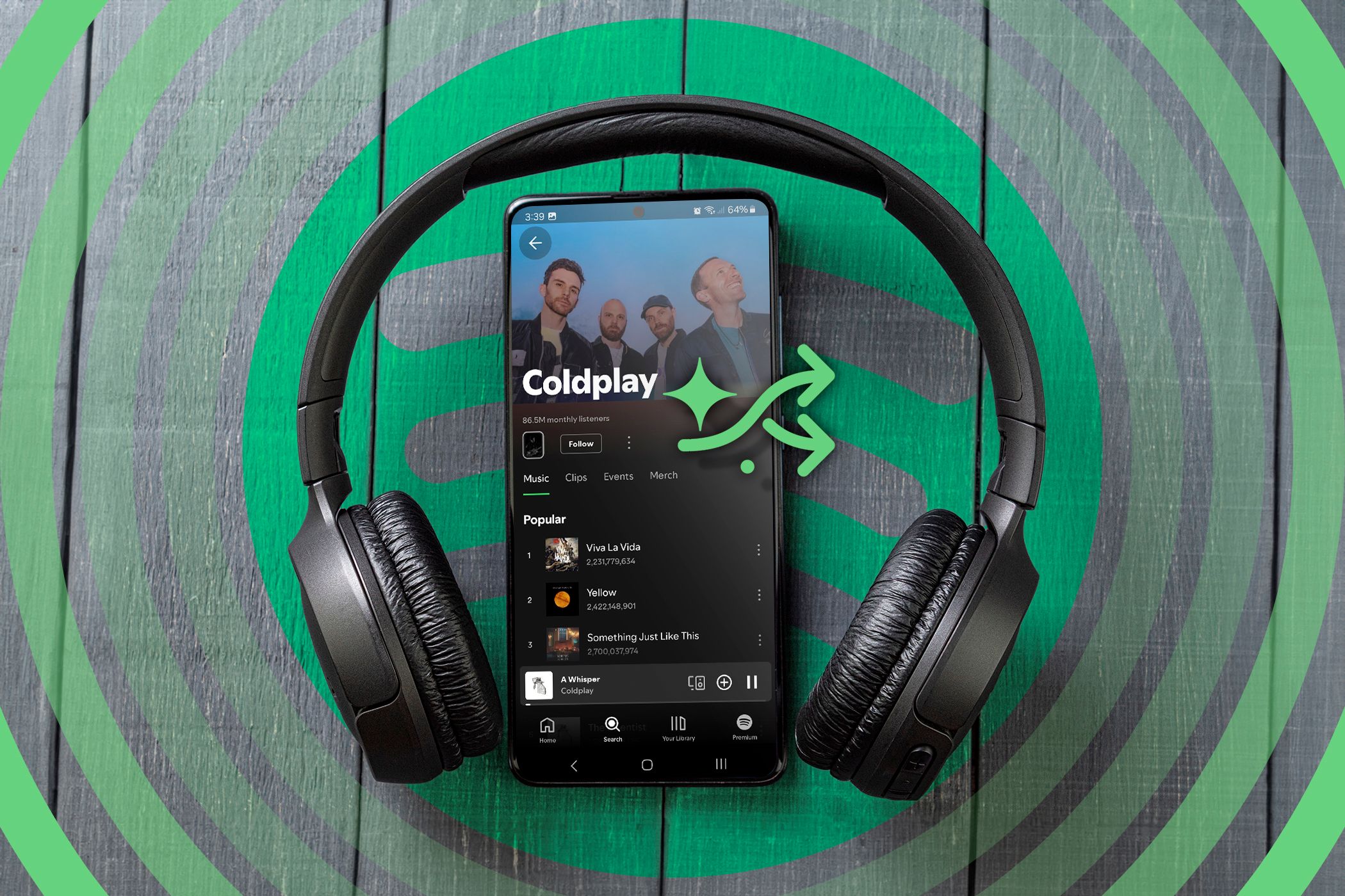 Наушники и телефон с приложением Spotify.