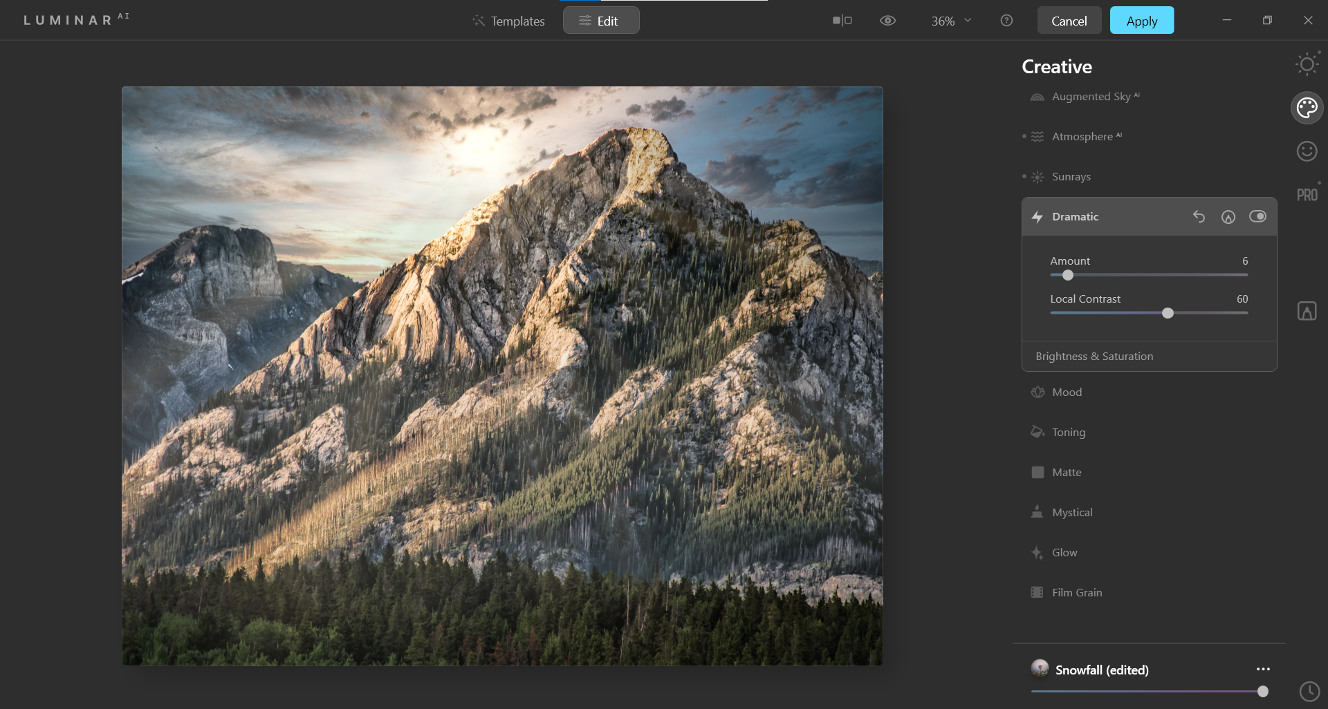массивные горы с драматичным небом