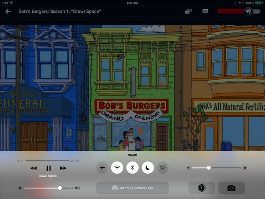 Пункт управления с кнопками яркости и мультимедиа