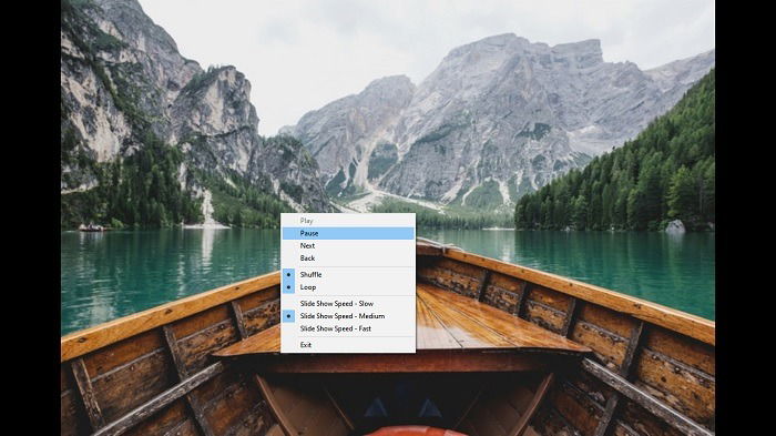 Изображение: контекстное меню с опциями воспроизведения в «Фотографиях»