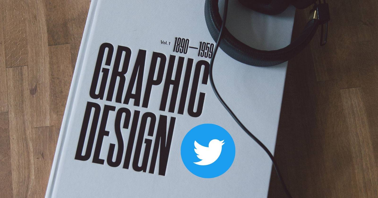 A book about graphic design on a table with the Twitter logo superimposed over it