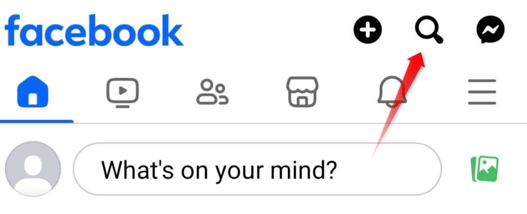 Указатель на значок лупы для поиска в Facebook.