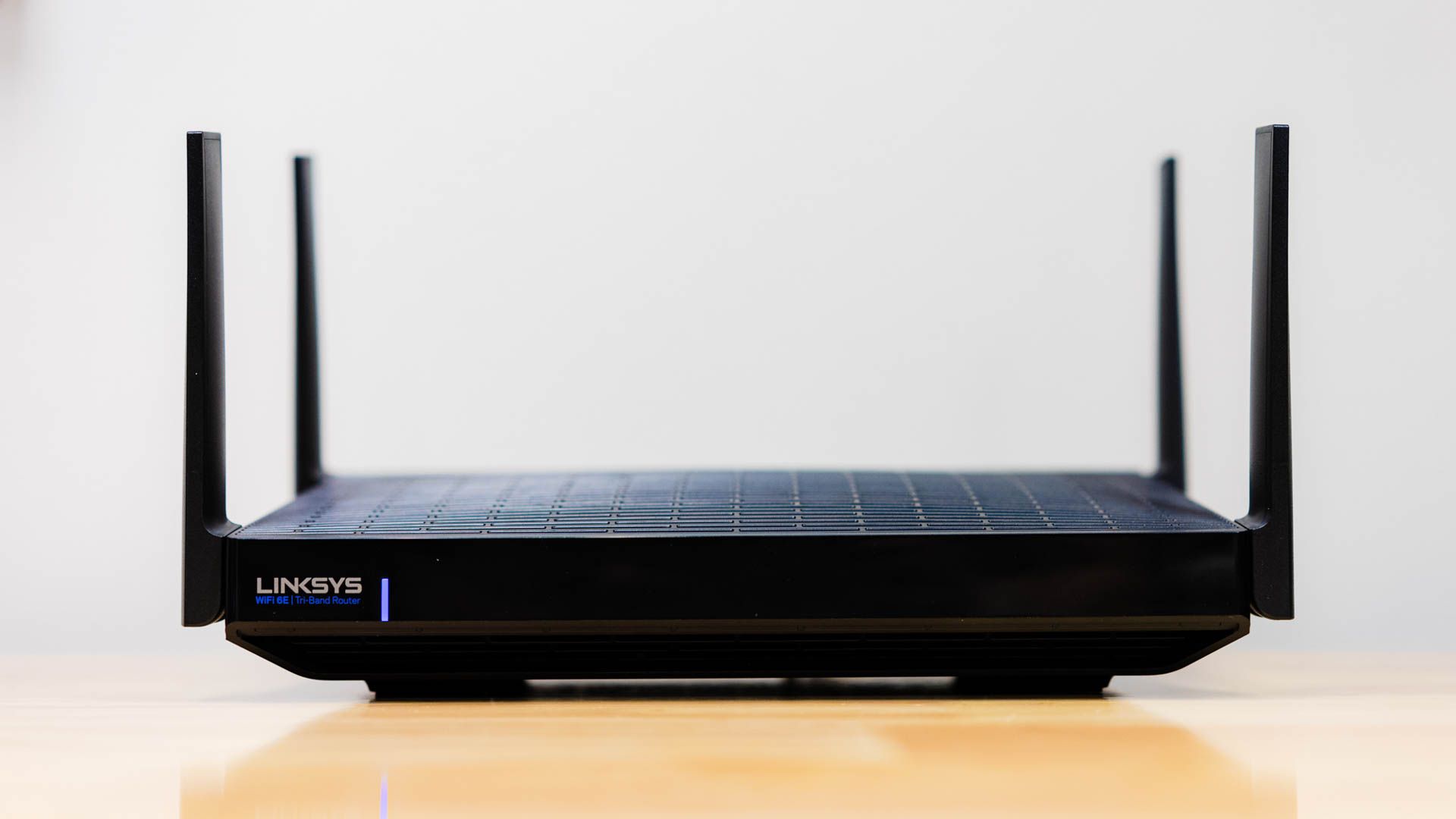 A Linksys tri-band router with four antennas set up