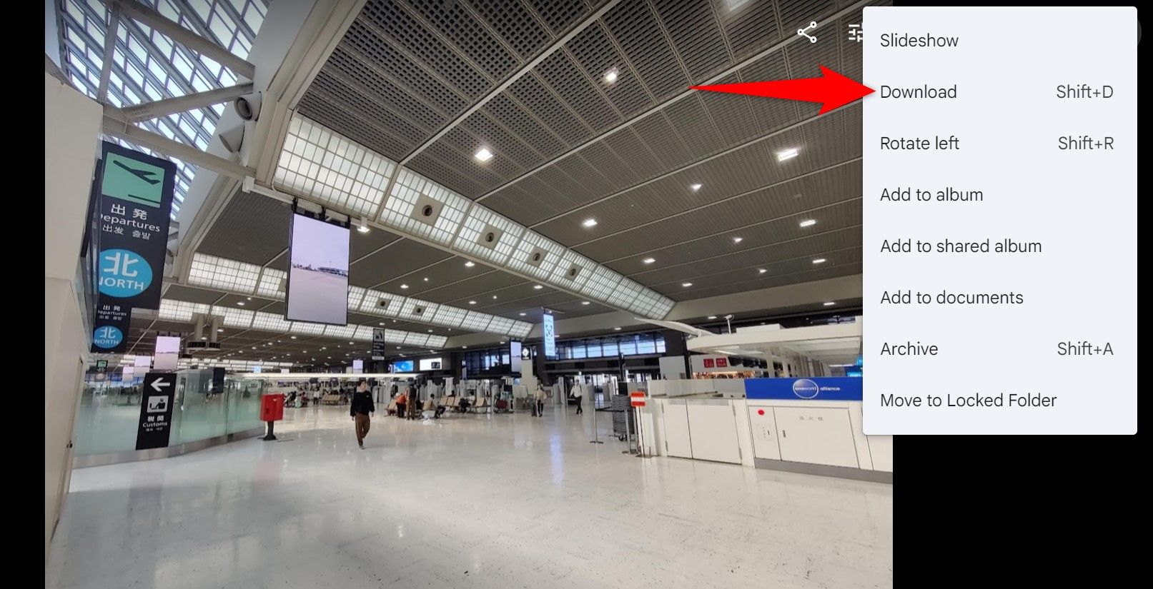 Подсветка кнопки «Скачать» на сайте Google Photos