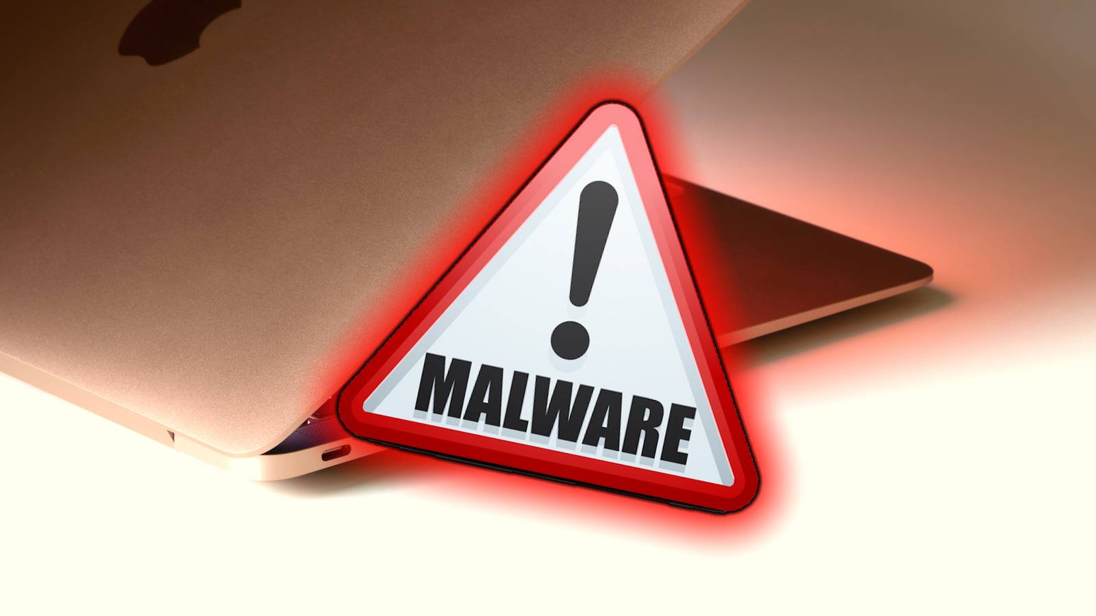 Изображение: предупреждение об угрозе вредоносного ПО для macOS на экране ноутбука
