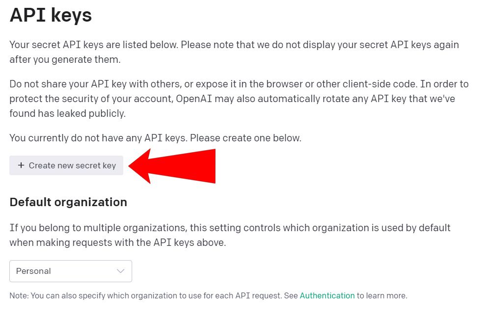 Красная стрелка у кнопки «Create new secret key» на странице OpenAI