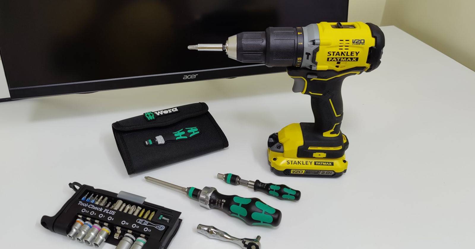 Stanley Fatmax cordless drill displayed alongside Wera hand tools