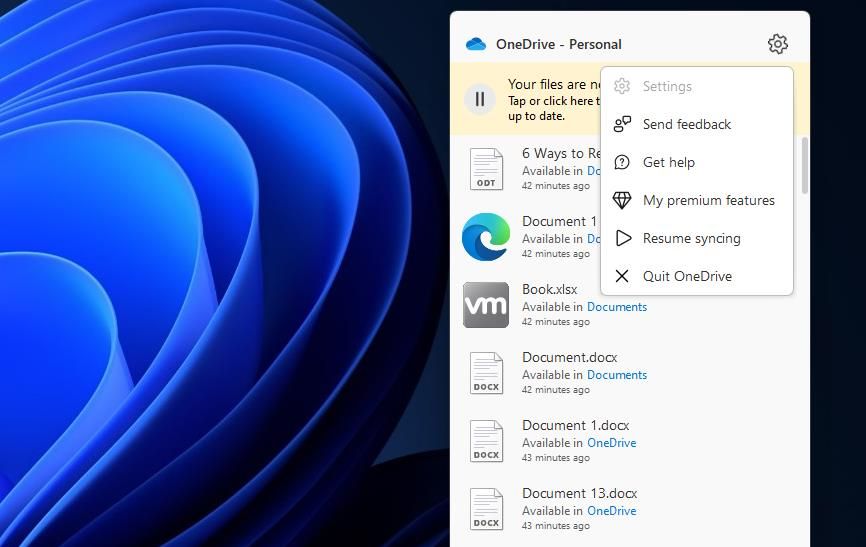 Опция Возобновить синхронизацию в меню OneDrive