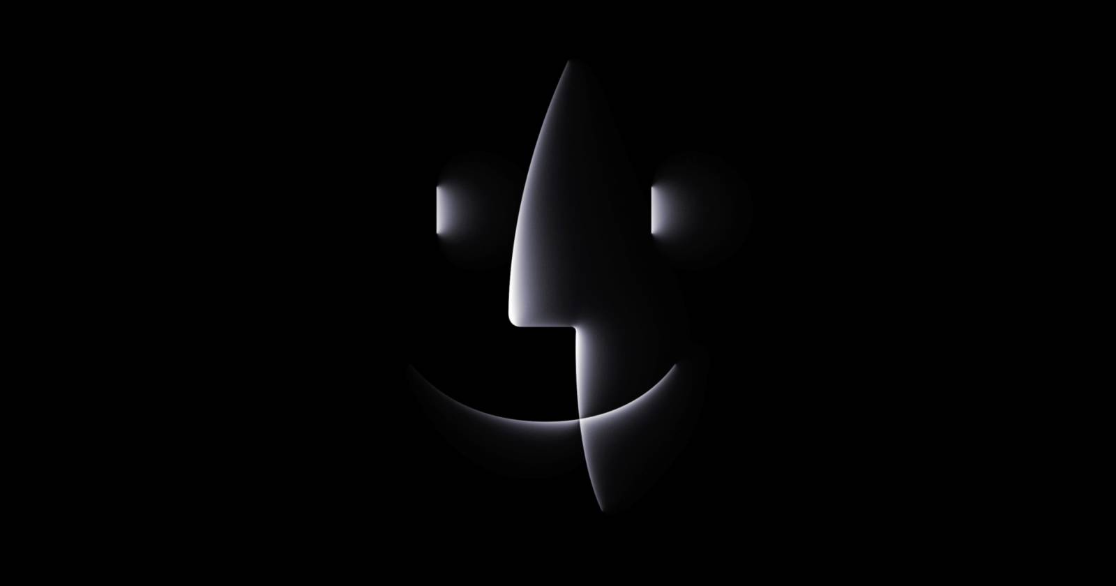 Логотип Apple в хэллоуинском стиле, превращённый в страшную версию иконки Finder «Happy Mac»