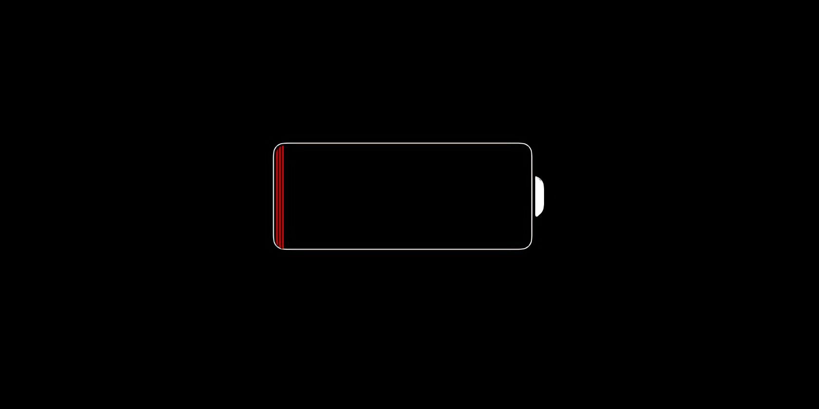 Большая иконка батареи iPhone с низким зарядом на тёмном фоне