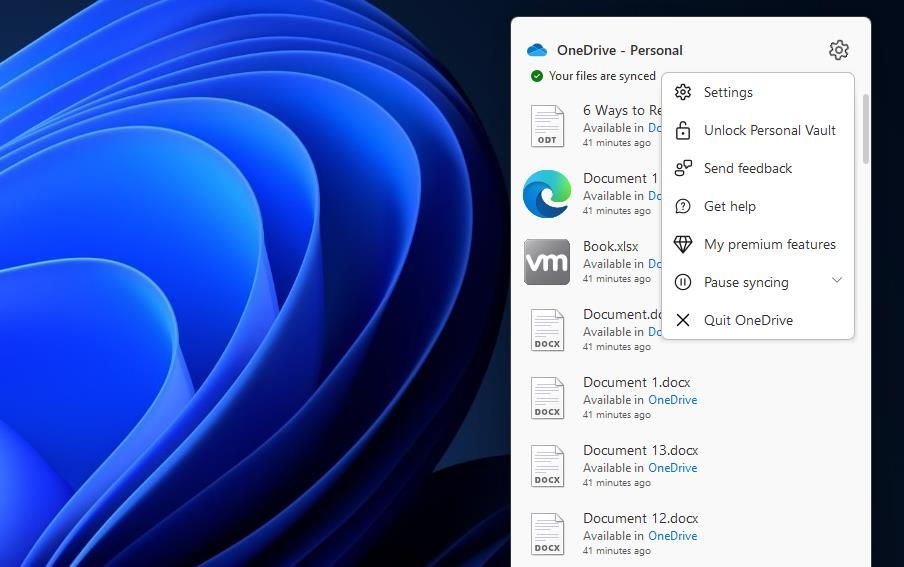 Опция Приостановить синхронизацию в меню OneDrive