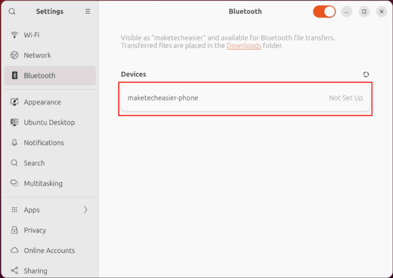 Скриншот с выделенной меткой телефона в окне Bluetooth Ubuntu.