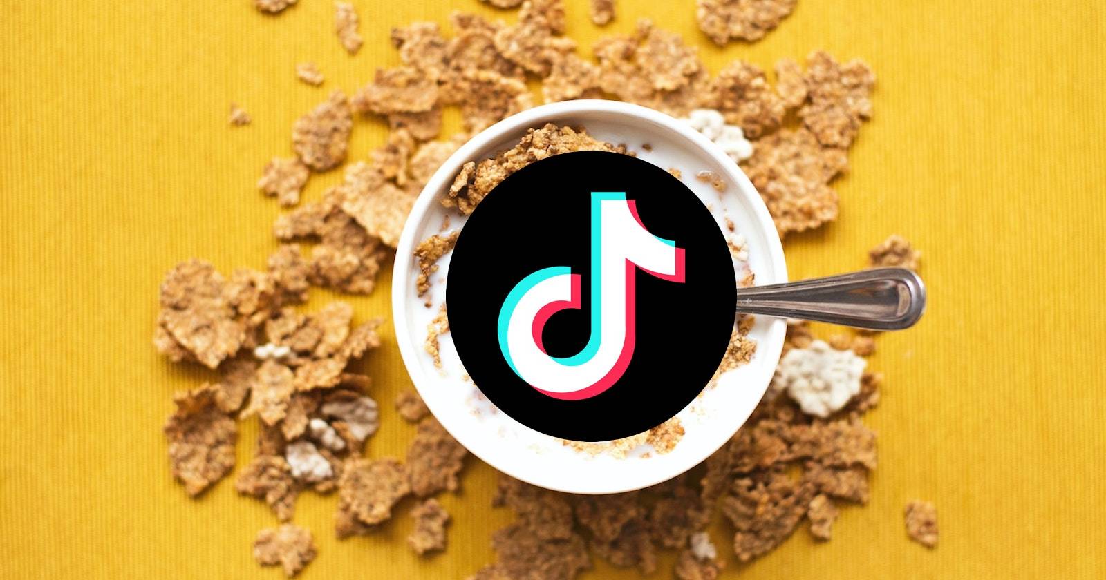 Сверху миска с хлопьями и логотипом TikTok на жёлтом фоне