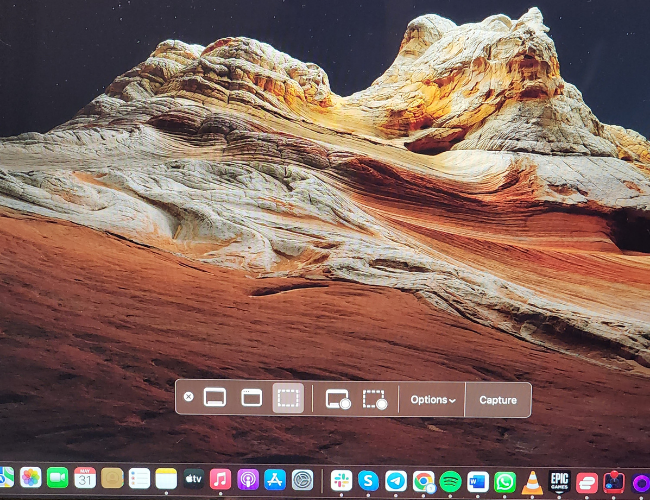 Панель инструментов Screenshot в macOS, отображающая пять опций захвата