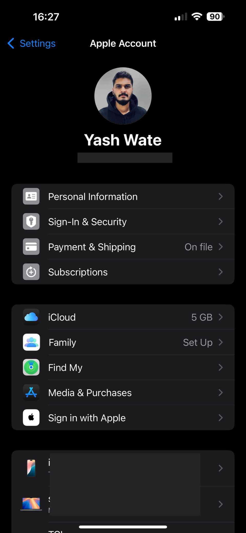 Apple Account page in iOS Settings app.