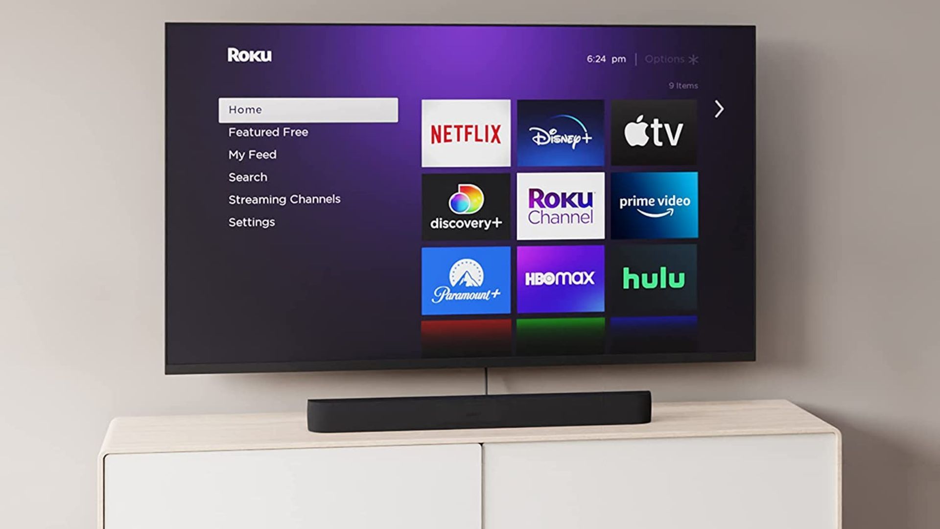 Roku Streambar Pro под настенным телевизором