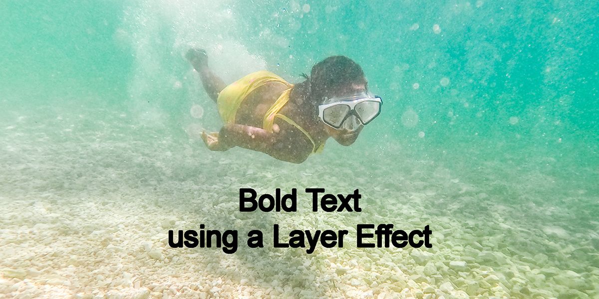 Дайвер под водой с подписью «Жирный текст с помощью эффекта слоя».