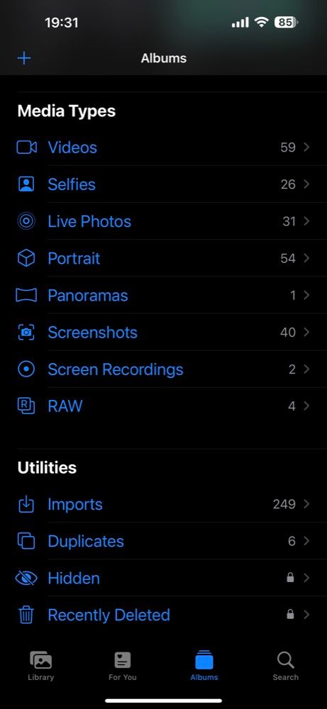 Вкладка «Альбомы» в приложении «Фото» на iPhone