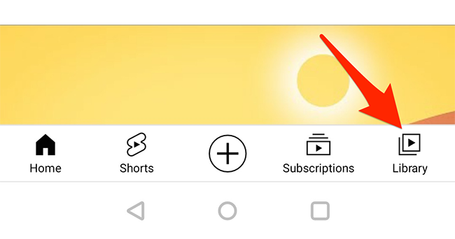 Выберите «Библиотека» внизу приложения YouTube.