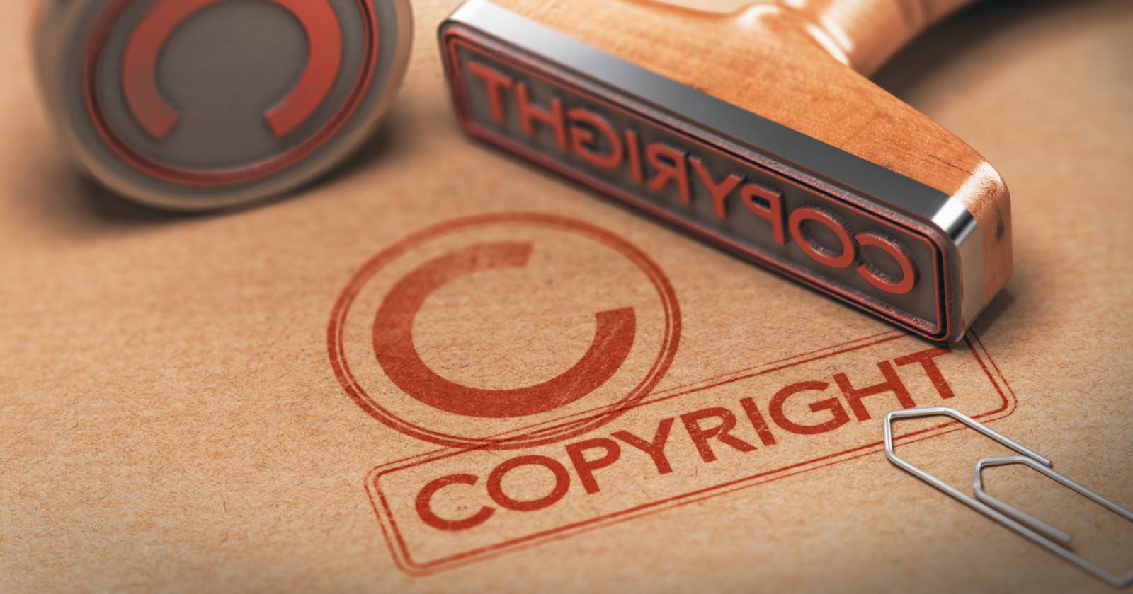 Оттиск печати с надписью «Copyright» на бумаге