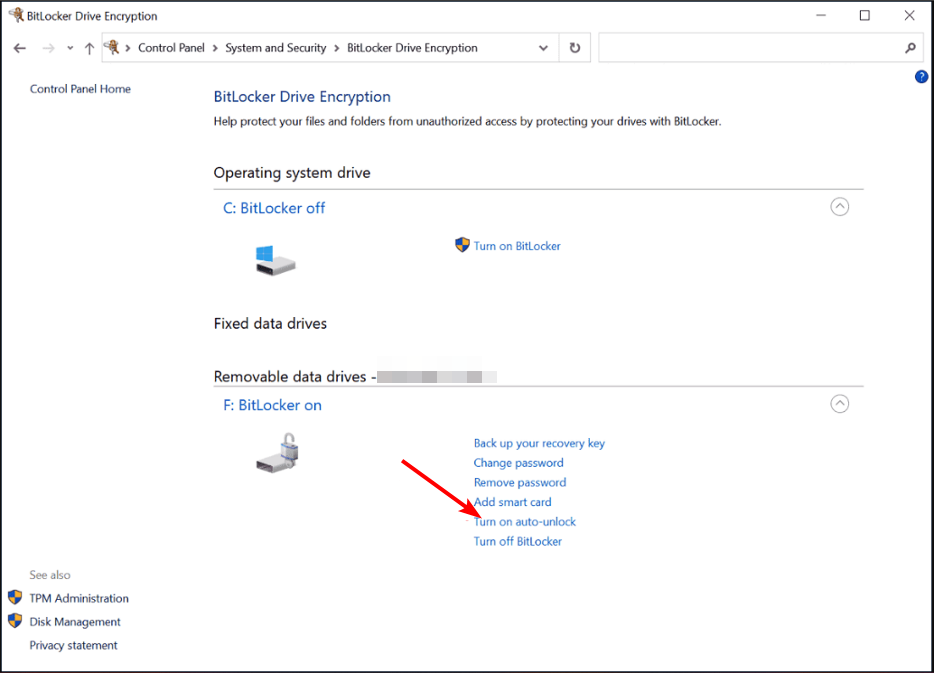 Список дисков с кнопками включения и отключения авторазблокировки BitLocker