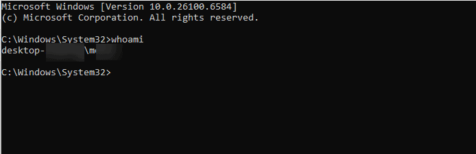 Вывод команды whoami в окне командной строки