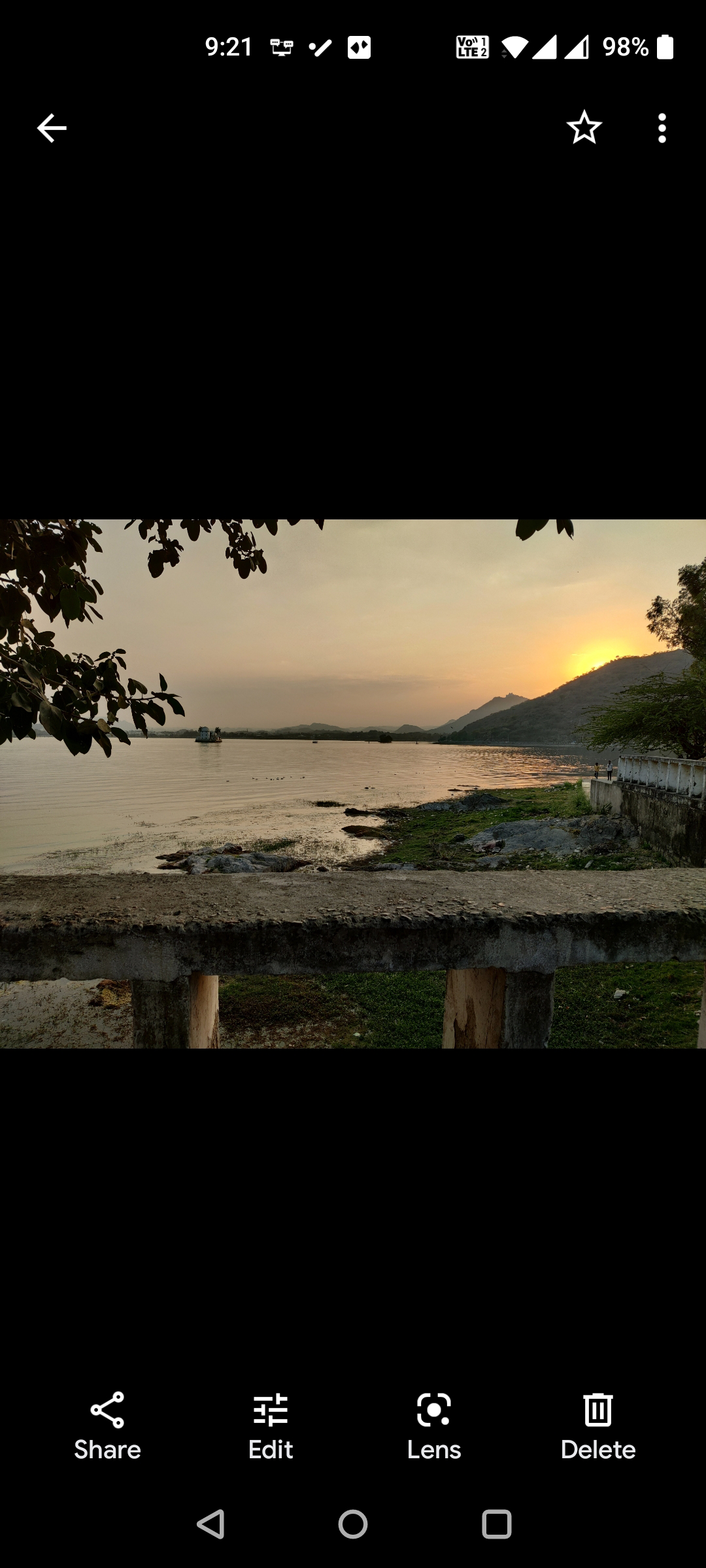 Выберите Изменить в Google Фото