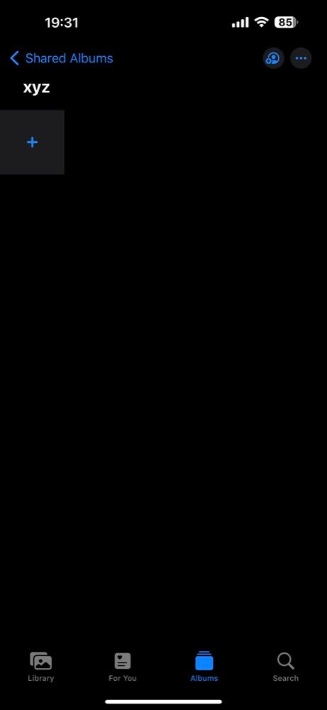 Просмотр содержимого общего альбома на iPhone