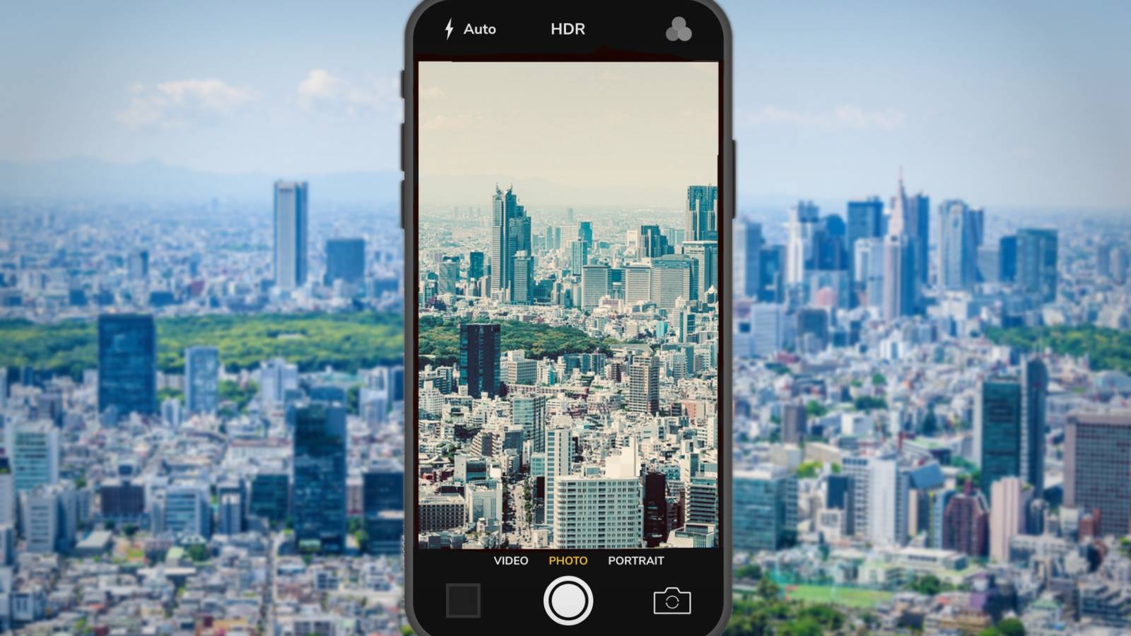 Вид города с наложением интерфейса для редактирования фото на iPhone и тёплым фильтром