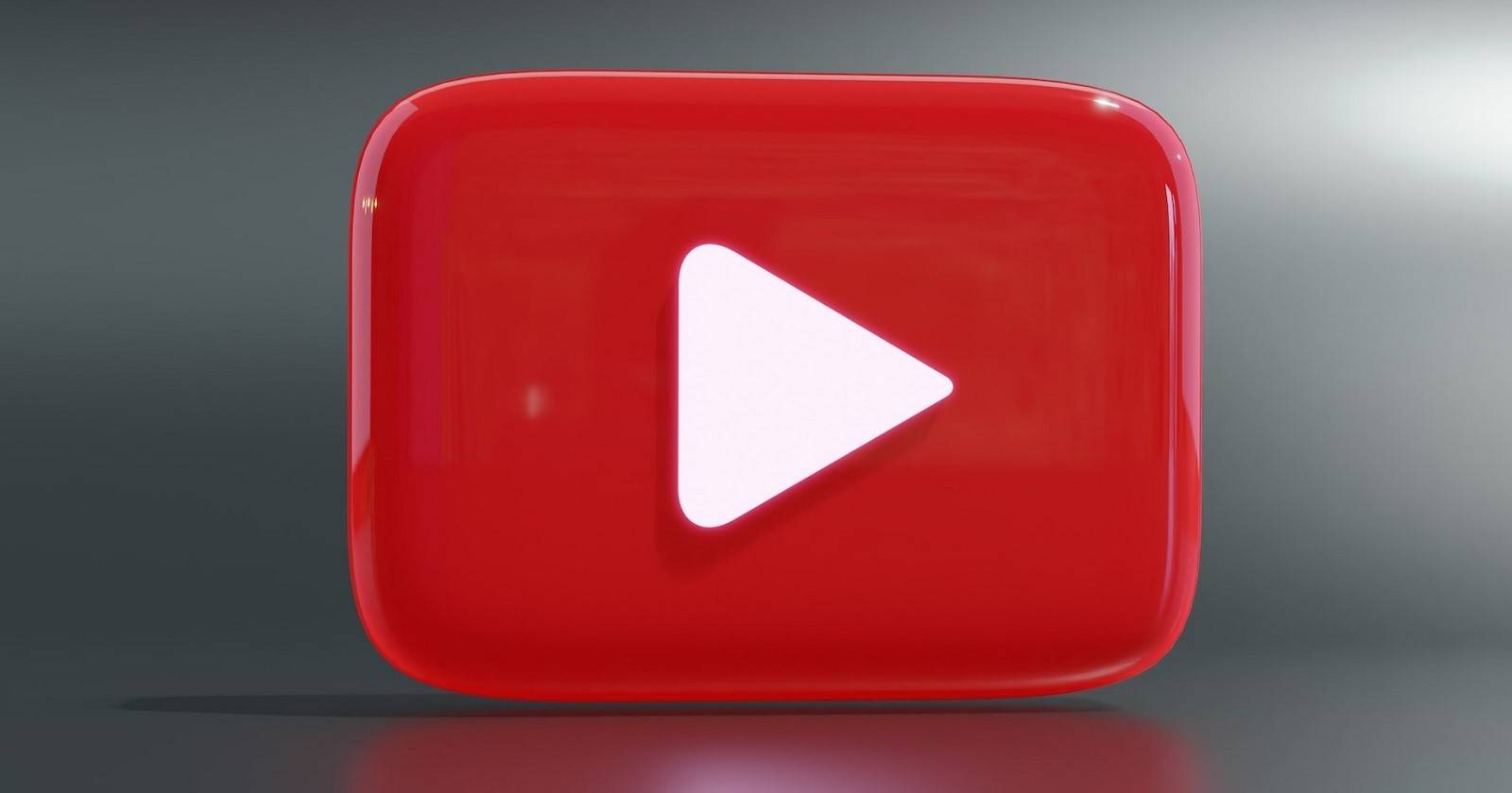 Изображение: 3D-иконка YouTube на тёмном фоне