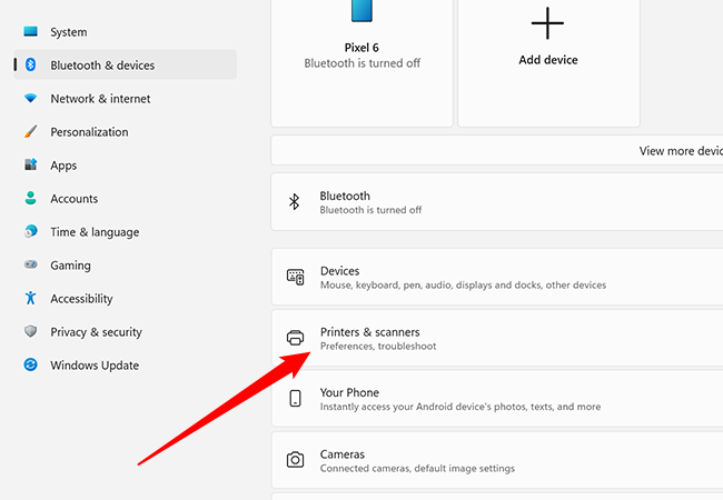 Нажмите «Принтеры и сканеры»