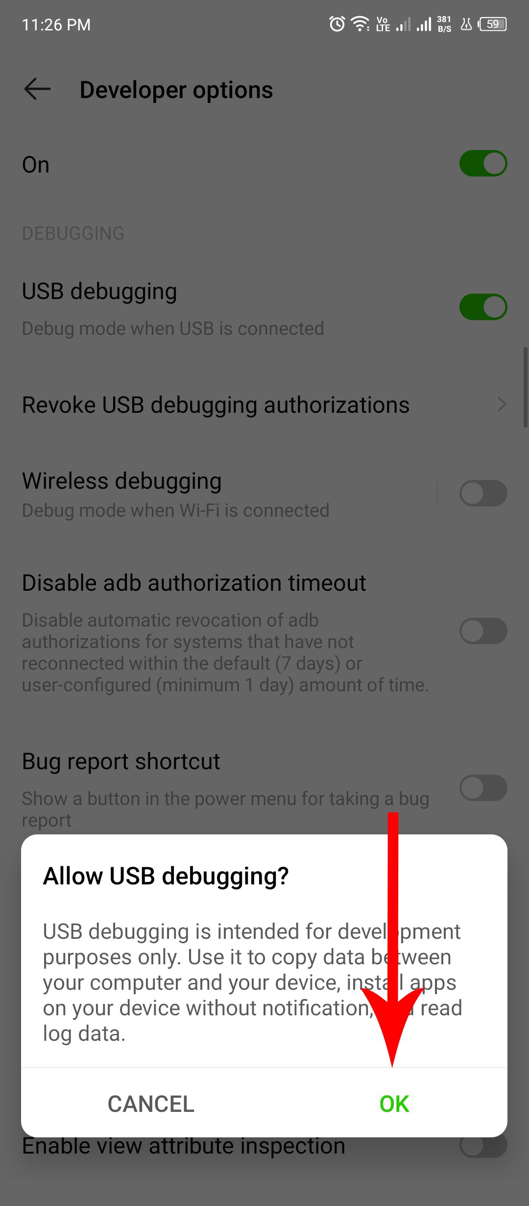 Подтверждение включения USB-отладки на телефоне.
