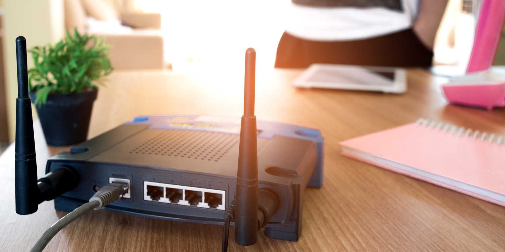 router on table showing rear lan ports