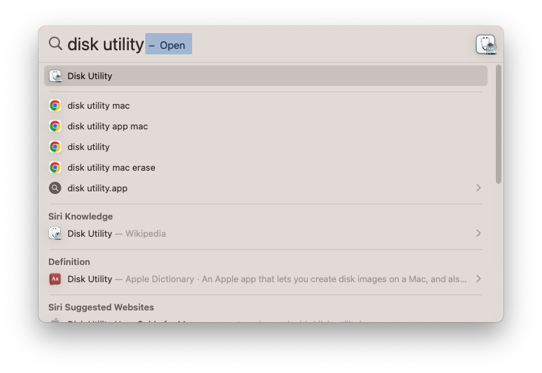 Поиск Дисковой утилиты в Spotlight
