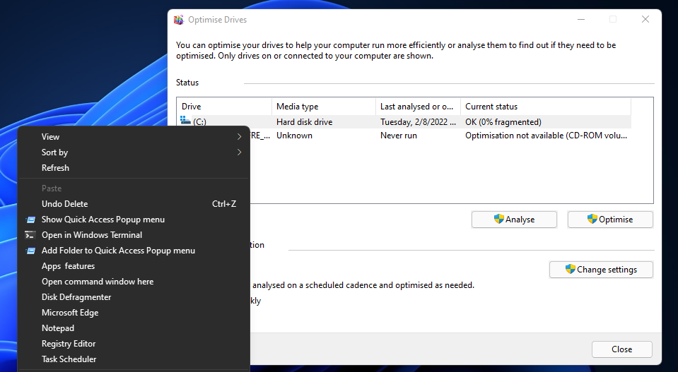 Окно Optimize Drives с выбором диска и кнопкой Оптимизировать
