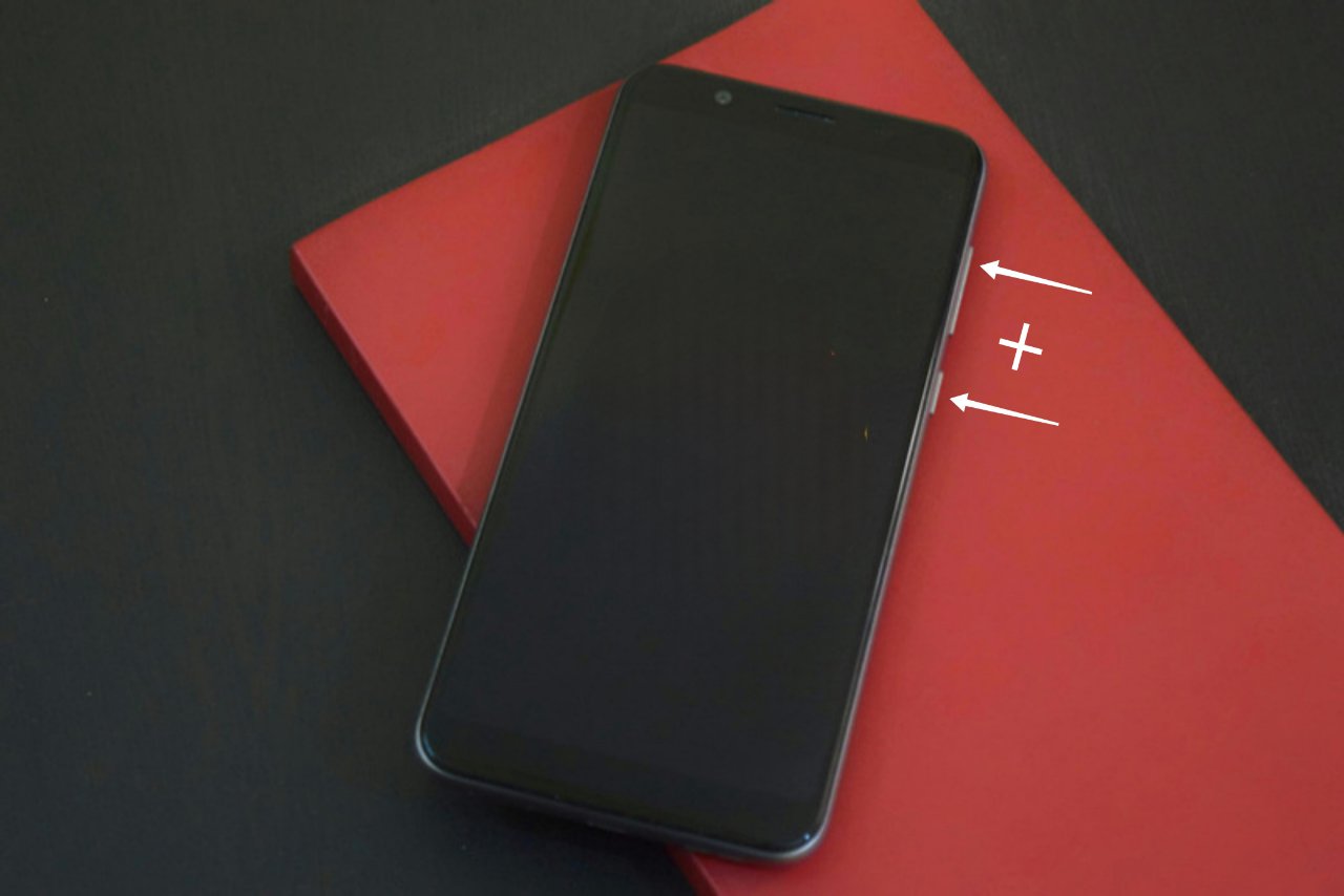 Volume Up + Power button 