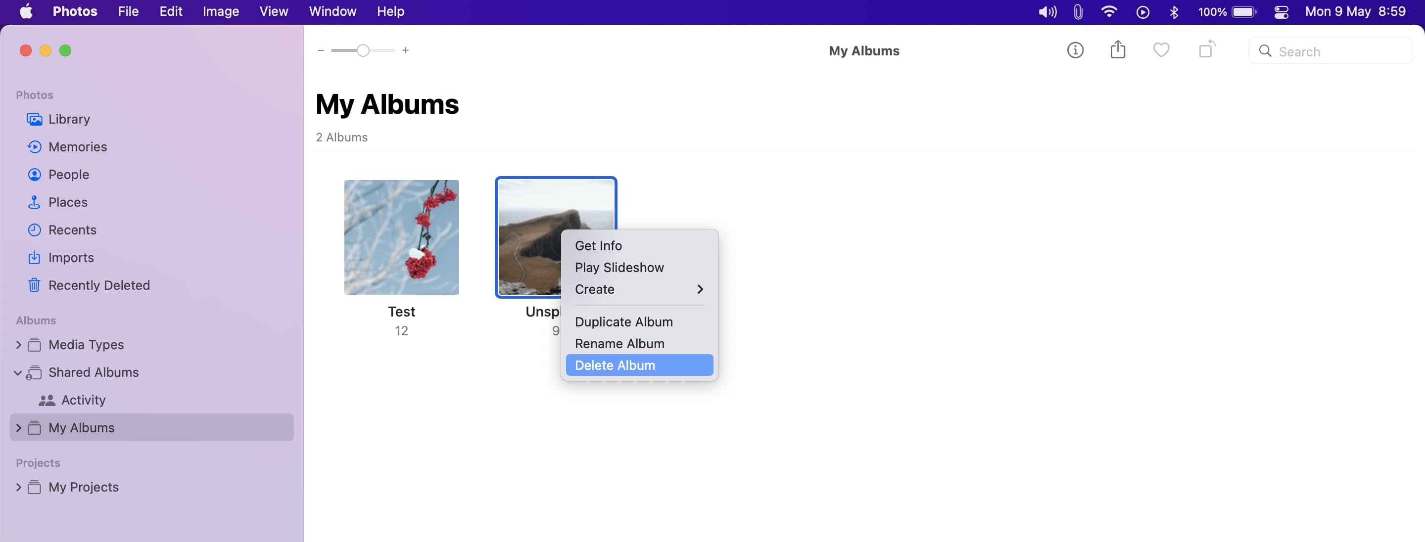 Окно приложения Фото на Mac с выделенным пунктом удаления альбома