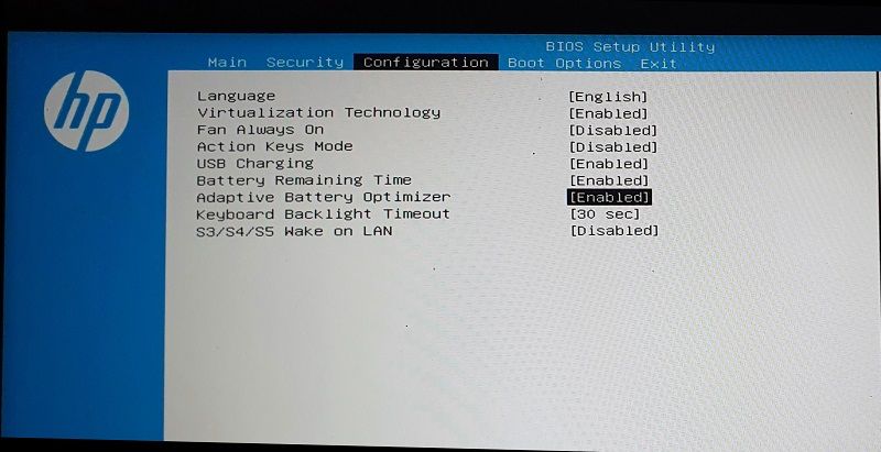 Включение адаптивной оптимизации батареи в BIOS ноутбука HP.
