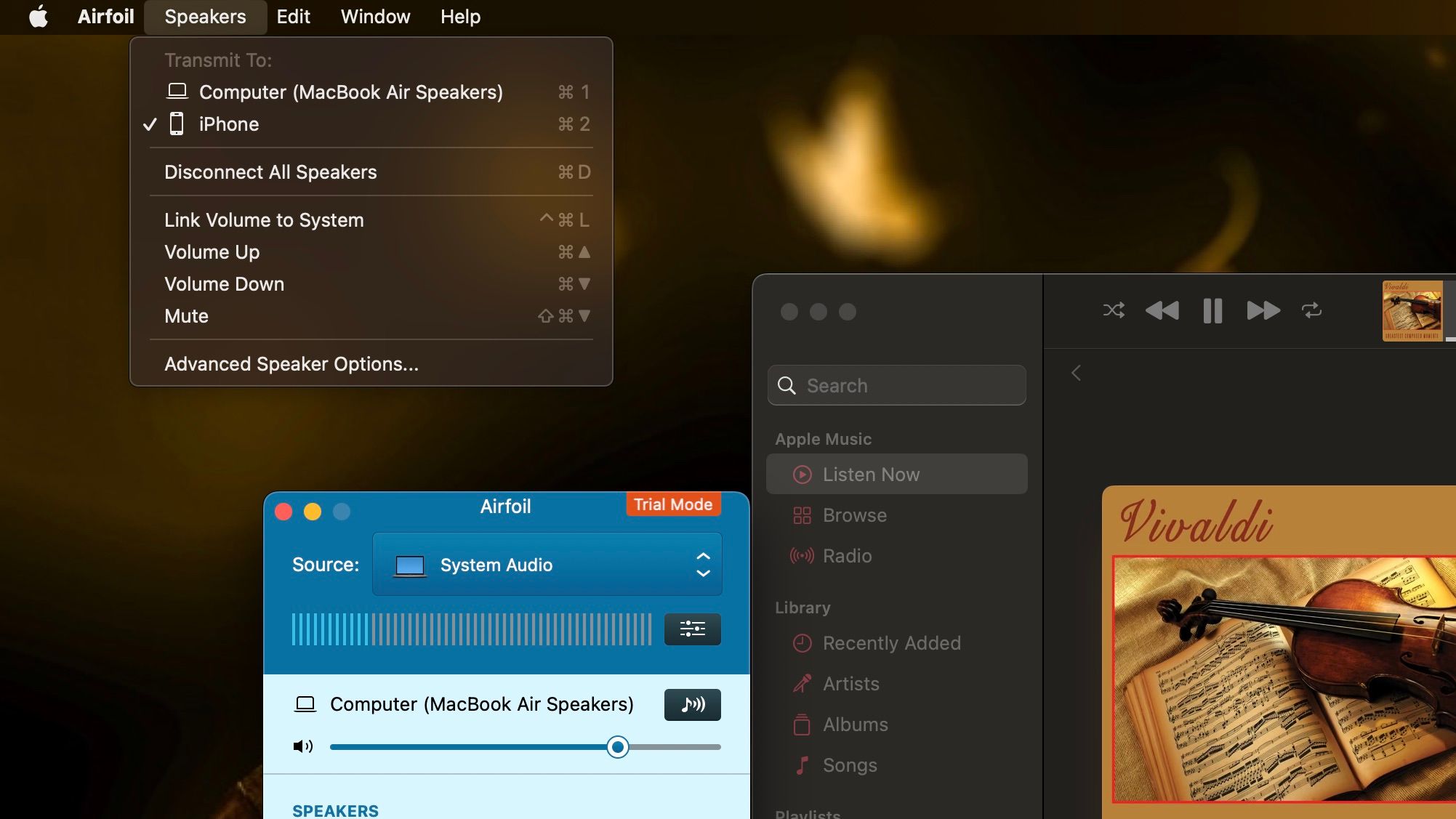 Navigate to Speakers in the menu bar and select your iPhone's name