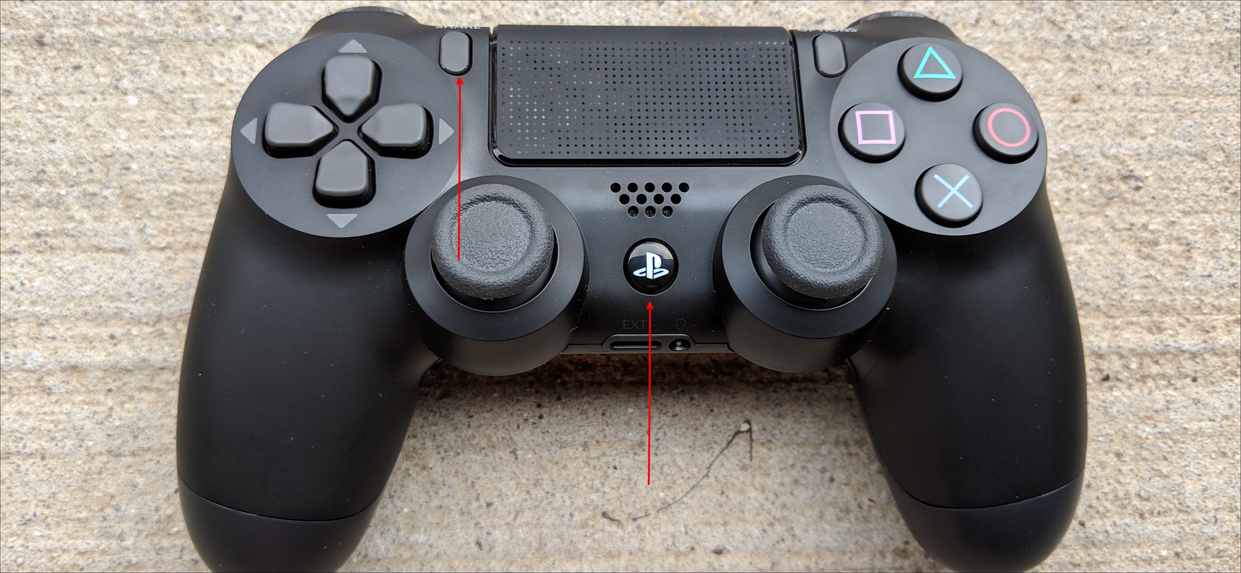 Кнопки SHARE и PlayStation на контроллере DualShock 4