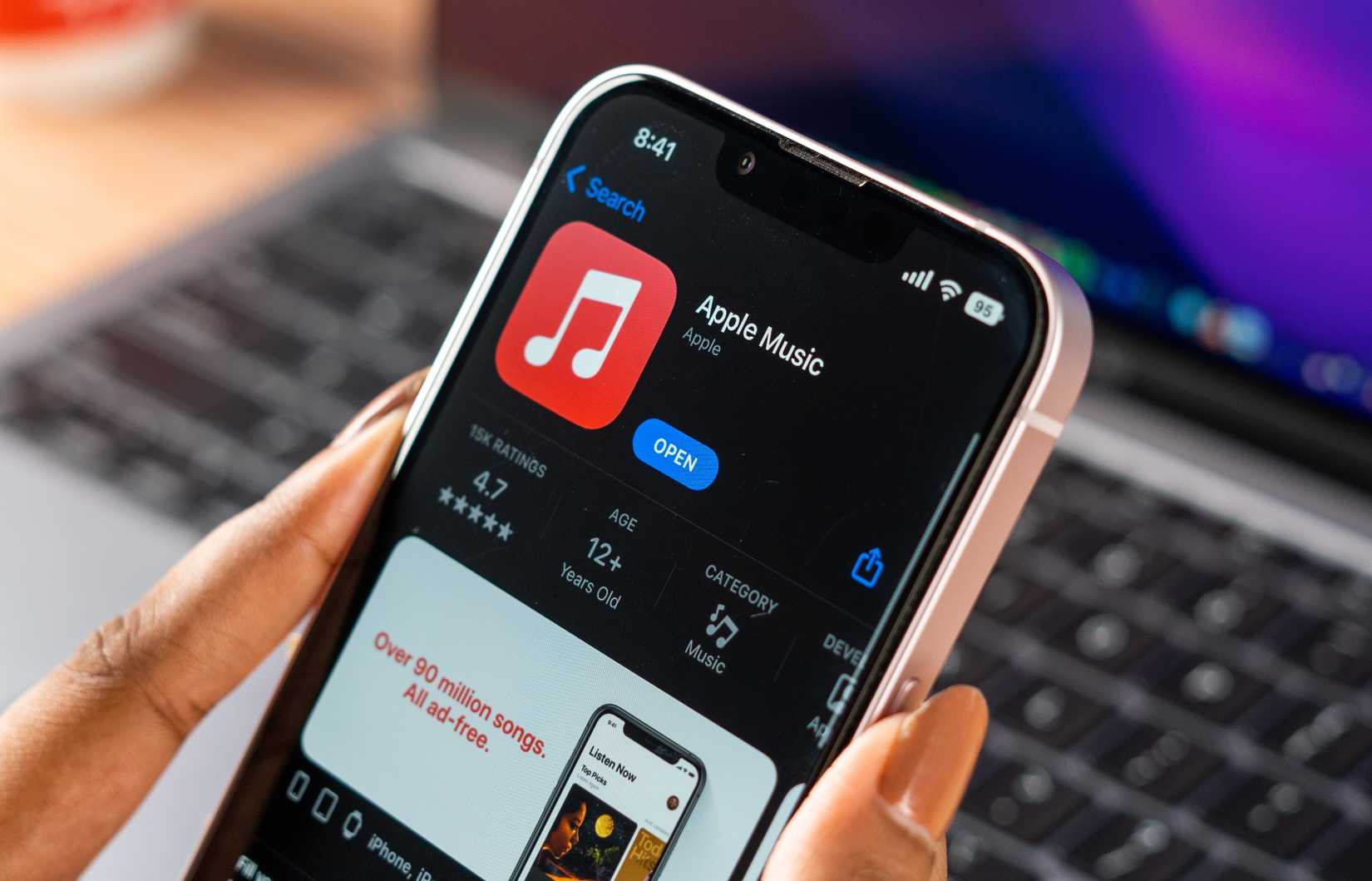 Apple Music logo on phone screen