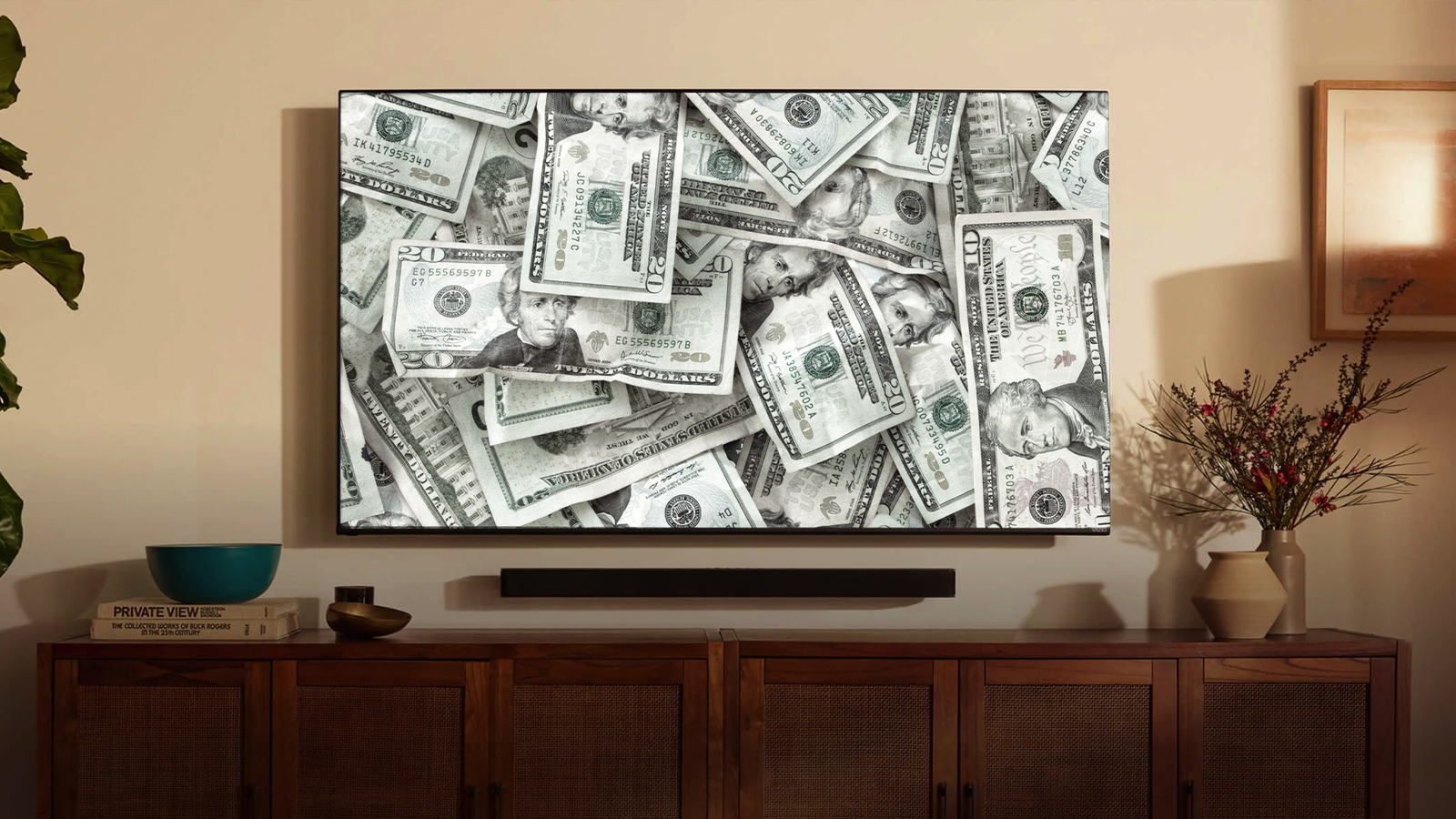Televisor mostrando imagem de notas de dinheiro.