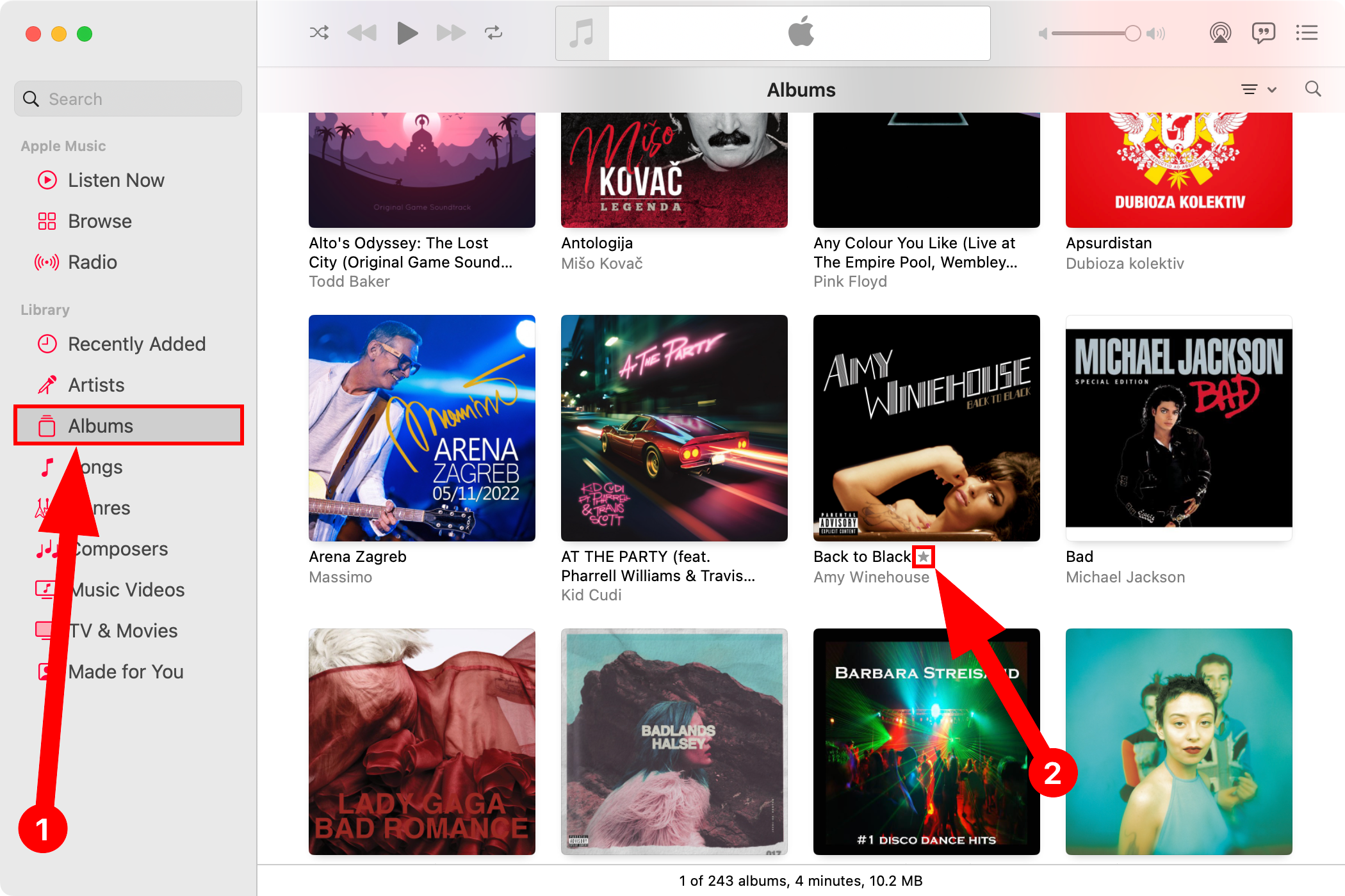 Значок звезды рядом с альбомом в Музыке на Mac.