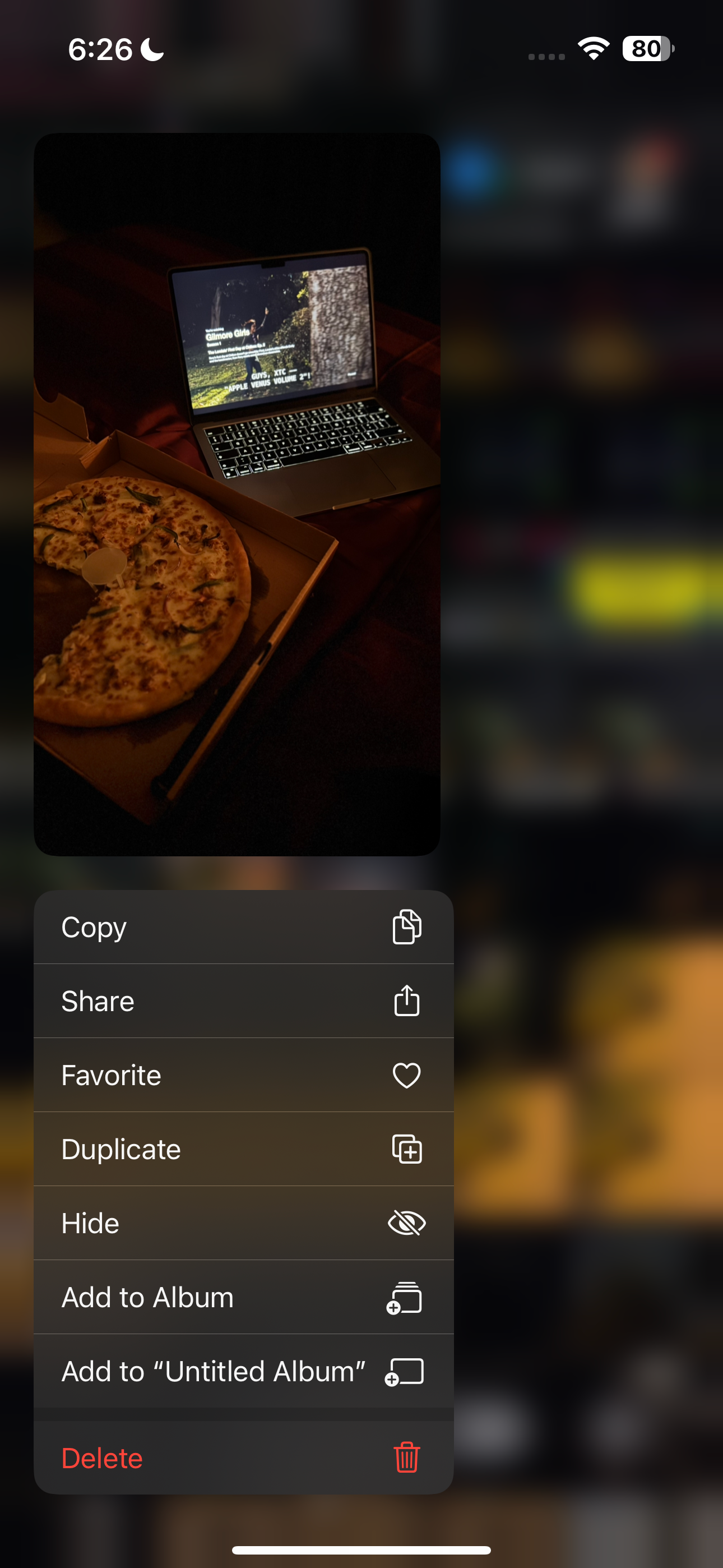 Pop-up menu that appears when long pressing an image in the iOS Photos app