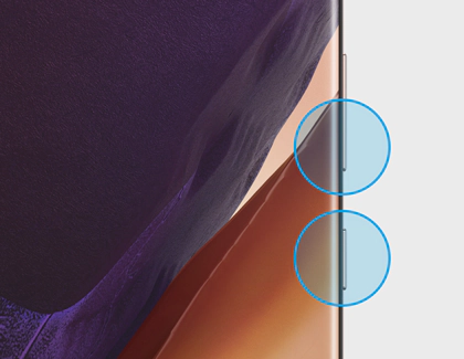 Кнопка питания и клавиша уменьшения громкости на боковой части телефона