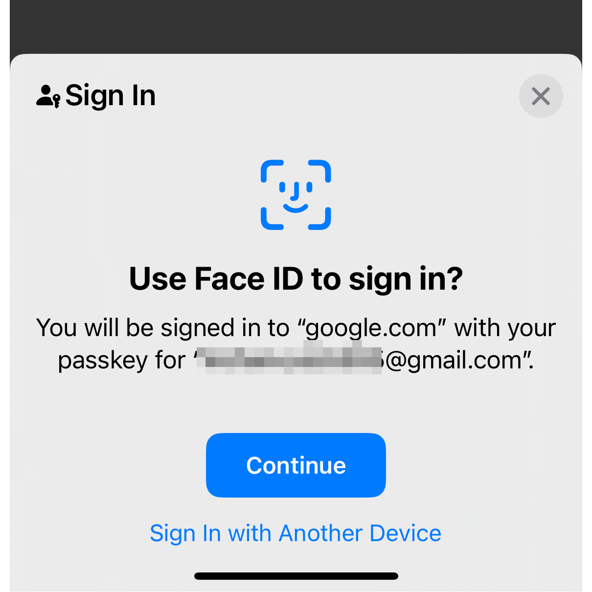 Запрос подтверждения входа через Face ID на iOS.