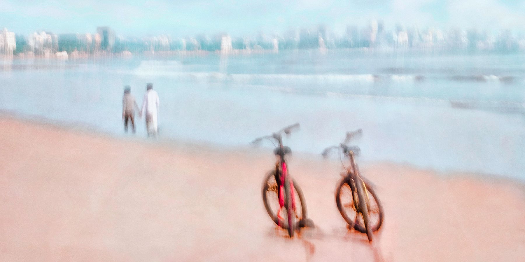 Couple walking along a beach